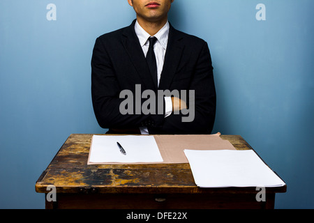 Young businessman is refusing to sign contract Stock Photo