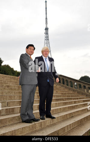The Mayor of London, Boris Johnson, welcomes £500 million investment to rebuild the Crystal Palace and restore Crystal Palace Park. The ambition is to rebuild the Crystal Palace as a new major cultural destination. It will be funded by Zhongrong Group from China. The plans were announced at a launch event today with the support of the Mayor of London and the leader of Bromley Council, Stephen Carr. Boris Johnson pictured with Mr Ni Zhaoxing, Chairman of the ZhongRong Group in Crystal Palace Park, South East London Credit:  lynn hilton/Alamy Live News Stock Photo