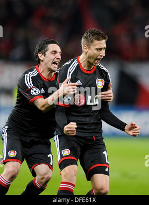 Leverkusen, Germany, 1st October, 2014. UEFA Champions League 2014/2015  Group stage Group C matchday 2, Bayer 04 Leverkusen (red) - Benfica  Lissabon (black) --- Heung-Min Son (Leverkusen) and Stefan Kie§ling  (Kiessling) (Leverkusen)