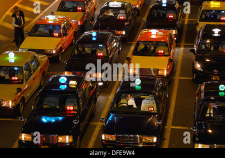 Taxi cabs waiting for a customer in front of Ueno station. Stock Photo