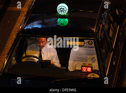 Taxi cab waiting for a customer in front of Ueno station. Stock Photo