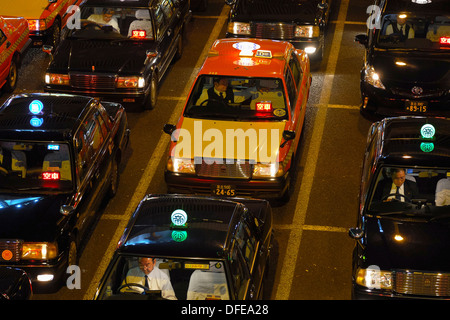 Taxi cabs waiting for a customer in front of Ueno station. Stock Photo