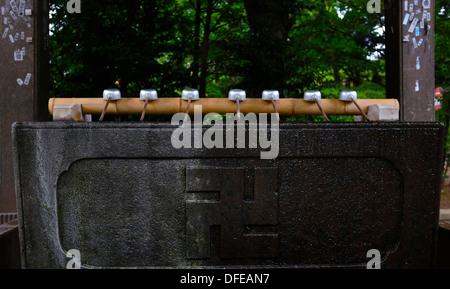 chozuya or temizuya.  Shinto water ablution pavilion. Nezu shrine. Stock Photo