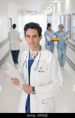 Portrait of smiling doctor in hospital Stock Photo