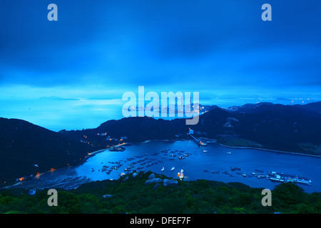 Landscape. Sunset over the mountains and the sea in h ongkong Stock Photo