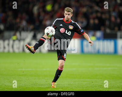 Leverkusen, Germany, 1st October, 2014. UEFA Champions League 2014/2015  Group stage Group C matchday 2, Bayer 04 Leverkusen (red) - Benfica  Lissabon (black) --- Heung-Min Son (Leverkusen) and Stefan Kie§ling  (Kiessling) (Leverkusen)