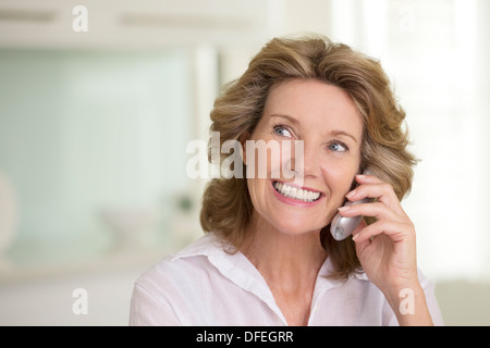 Senior woman talking on telephone Stock Photo