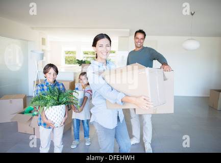 Family moving into new house Stock Photo