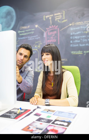 Business people working at computer in office Stock Photo