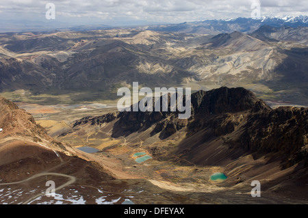 Looking down onto surrounding valley, lakes and mountains of the Cordillera Real, from the 5421 metre (17,785 ft) summit of Chacaltaya, near La Paz, Bolivia Stock Photo