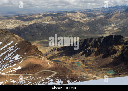 Looking down onto surrounding valley, lakes and mountains of the Cordillera Real, from the 5421 metre (17,785 ft) summit of Chacaltaya, near La Paz, Bolivia Stock Photo