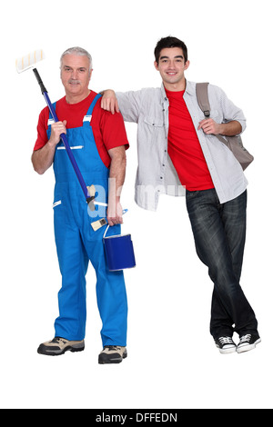 Experienced and apprentice painter Stock Photo