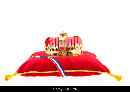 Golden crown on red velvet pillow for coronation in Holland Stock Photo