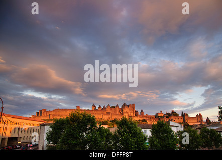 The fortified city of Carcassonne from the Pont Vieux bridge crossing the Aude river Stock Photo