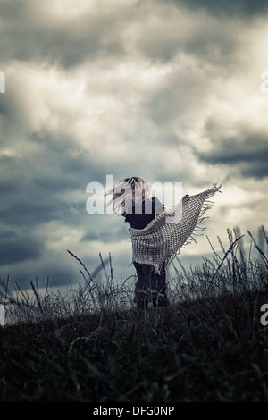 a girl is running on a meadow Stock Photo