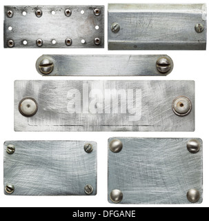 Metal plates with screws and rivets. Isolated textures Stock Photo