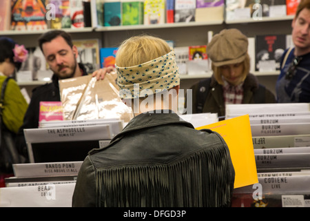 Customers browsing the Vinyl in Rough Trade East Music Store, Brick Lane, London Stock Photo