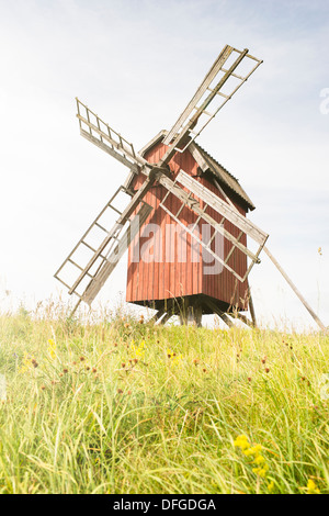Old fashioned wooden windmill on a hill in Skanninge, Sweden Stock Photo