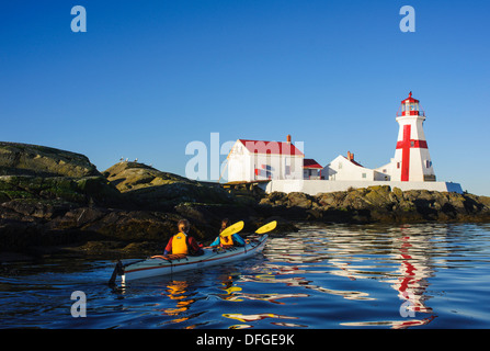 tandem kayaking at East Quoddy Lighthouse Campobello Island Stock Photo