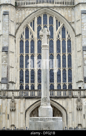 The stained glass window of the west front of Winchester Cathedral with the War Memorial in the foreground Stock Photo