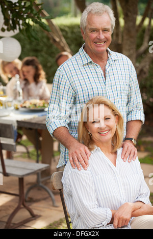 Senior couple smiling outdoors Stock Photo