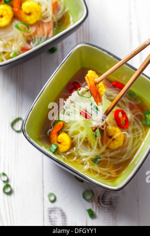 Thai soup with prawns and noodles Stock Photo