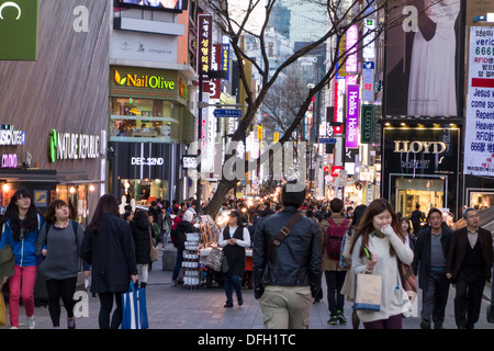 Busy pedestrianised street in Myeongdong in the evening, Seoul, Korea Stock Photo