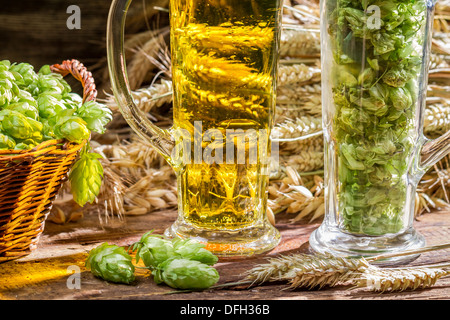 Ears of wheat in the golden fresh beer Stock Photo