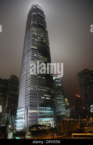 Two International Finance Centre (2IFC) Hong Kong China seen at night in heavy mist Stock Photo