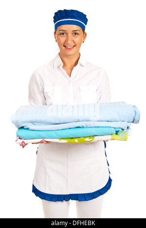 Happy hotel maid ready to change beds isolated on white background Stock Photo