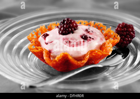 Blackberry mousse in a brandy snap biscuit Stock Photo