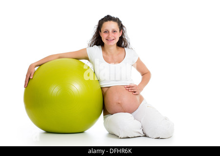 Pregnant woman exercises with gym ball Stock Photo