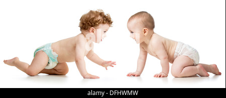 two crawling babies boy and girl Stock Photo
