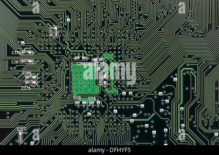 Closeup Detail of Printed Electronic Circuit Board with many Components, Horizontal shot Stock Photo