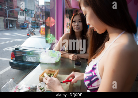 Betelnut girl in a betelnut booth in Taiwan Stock Photo