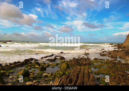 Beach at Bude, Devon with crashing waves Stock Photo