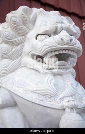 Lion statue outside the Chinese research station building at Ny-Ålesund, Spitsbergen, Svalbard Archipelago, Norwegian Arctic Stock Photo