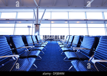Empty seats at an airport terminal. Stock Photo