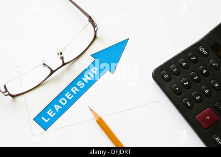 Leadership concept - arrow pointing up graph printed on white paper Stock Photo