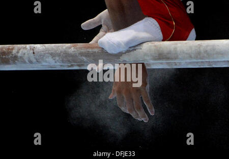 Antwerp, Belgium. 06th Oct, 2013. A gymnast prepares on the parallel bars at the Artistic Gymnastics World Championships in Antwerp, Belgium, 06 October 2013. Photo: MARIJAN MURAT (For editorial use only)/dpa/Alamy Live News Stock Photo