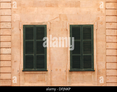 Shuttered windows Stock Photo