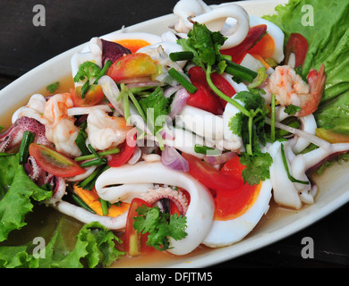 Taste of Thailand - Thai Salted Egg Spicy Seafood Salad  (Yam Khai Khem ) Stock Photo