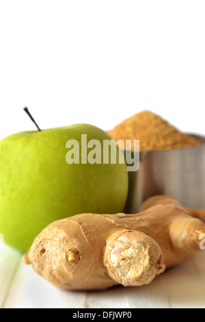 Ingredients for ginger marmalade: ginger, granny Smith apple, dark sugar Stock Photo