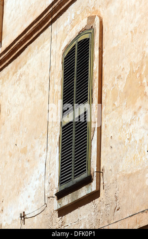 Shuttered windows Stock Photo