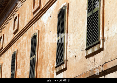 Shuttered windows Stock Photo