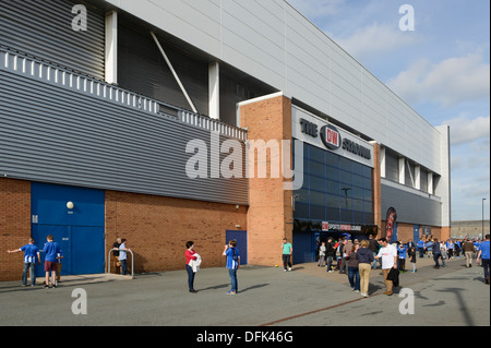 Fans outside the DW Stadium, home of Wigan Athletic Football Club and Wigan Warriors Rugby League FC. Stock Photo