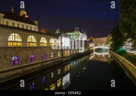 Ljubljana, Triple Bridge and river Ljubljanica at night Stock Photo