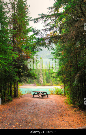 Campsite on rivers edge Stock Photo