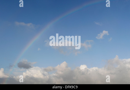 Blue sky and rainbow photo Stock Photo - Alamy