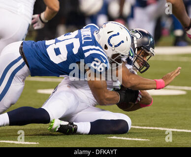 Indianapolis, Ohio, USA. 6th Oct, 2013. October 06, 2013: Indianapolis Colts free safety Delano Howell (26) covers Seattle Seahawks quarterback Russell Wilson (3) as he sacks him during the NFL game between the Seattle Seahawks and the Indianapolis Colts at Lucas Oil Stadium in Indianapolis, IN. The Indianapolis Colts defeated the Seattle Seahawks 34-28. Credit:  csm/Alamy Live News Stock Photo